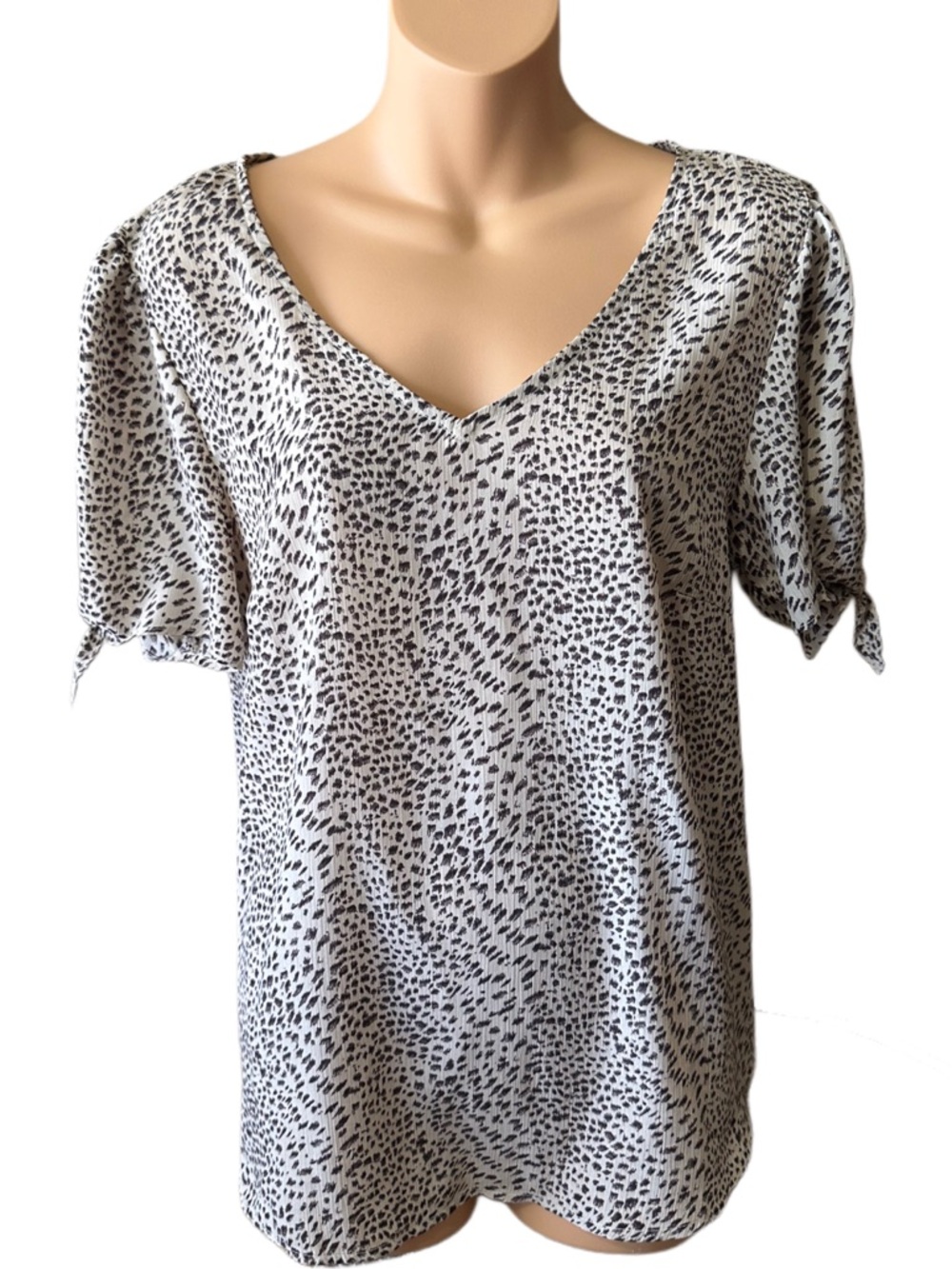 Kori White and Black Cheetah Print V-Neck Short Tie Sleeves Printed Blouse